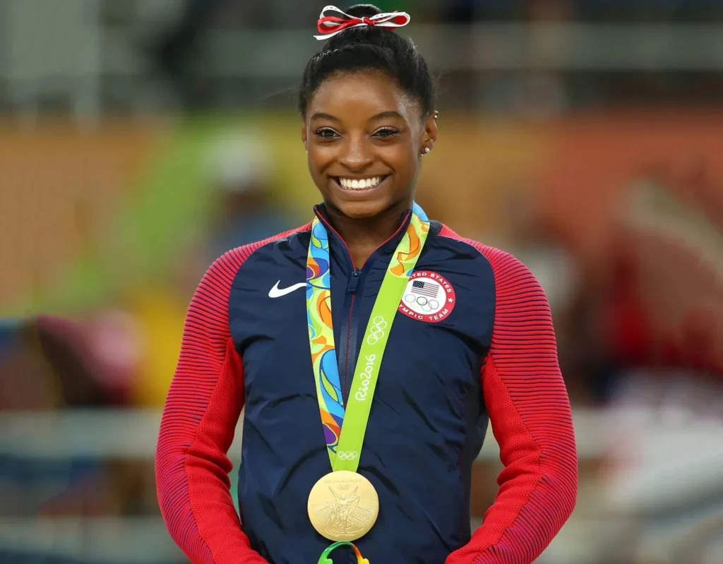 Simone Biles, Olympic gymnast and advocate for mental health awareness.